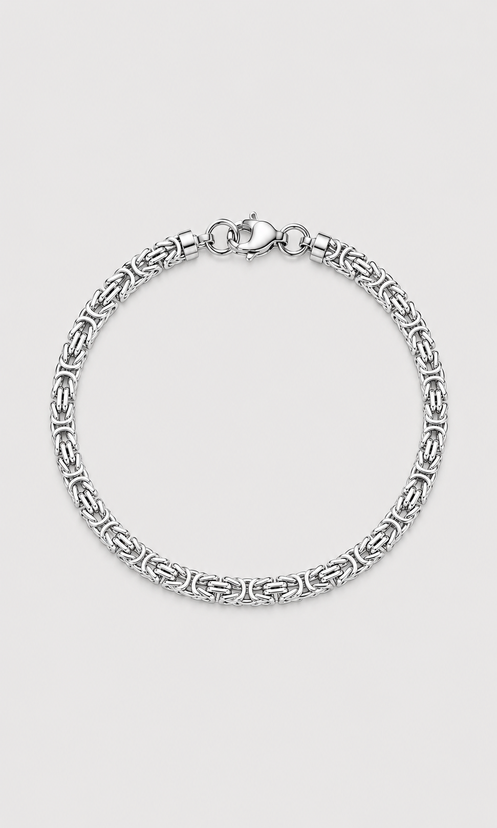 A silver-toned chain bracelet with a textured, interlocking link pattern and a lobster clasp, displayed on a light gray background.