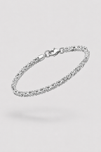 A silver-toned metal chain bracelet with a lobster clasp, shown floating against a light gray background.