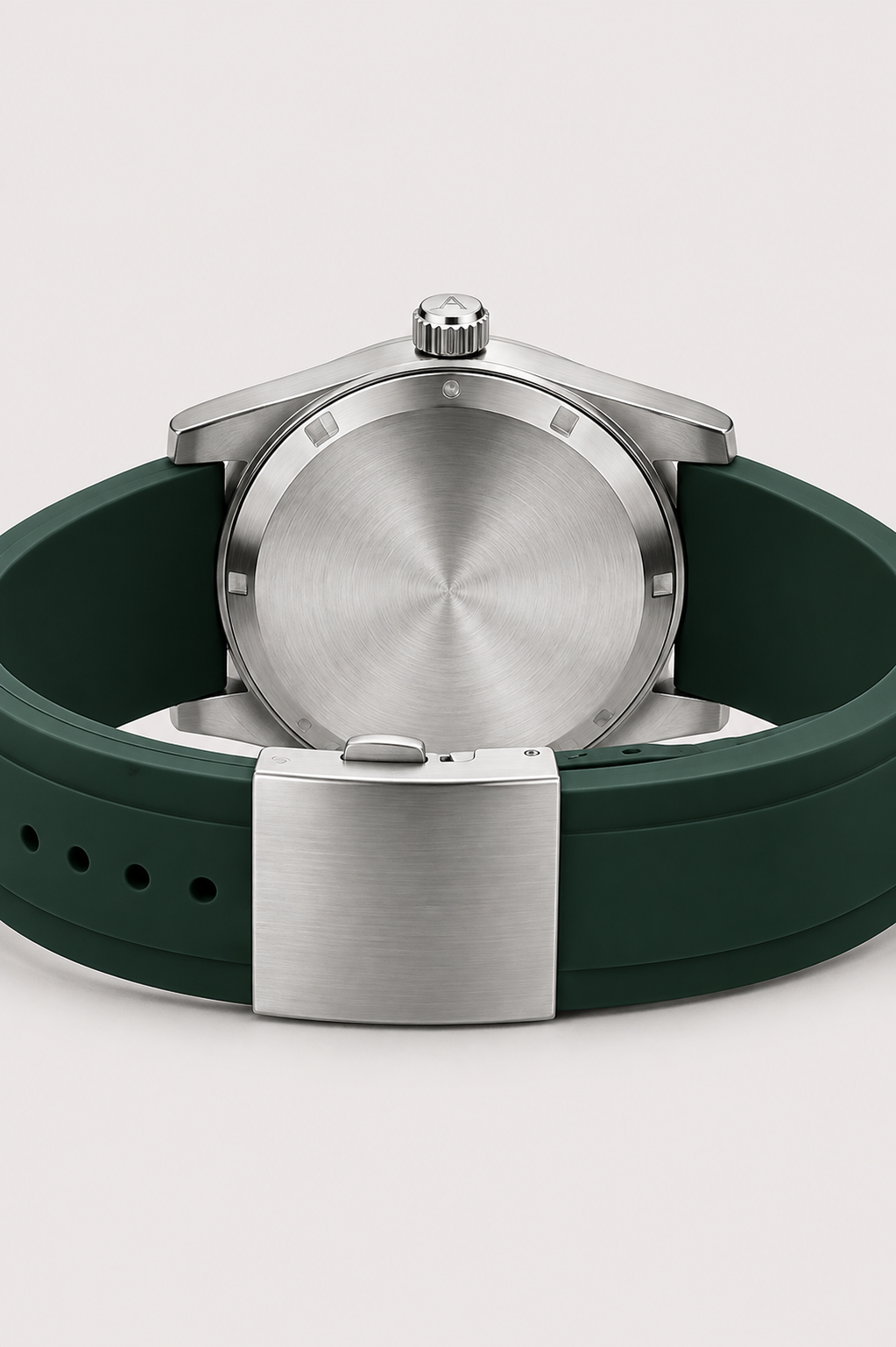 Aneesa wrist watch with a green dial and green rubber strap, featuring a silver fluted bezel and date window, shown against a light gray background.