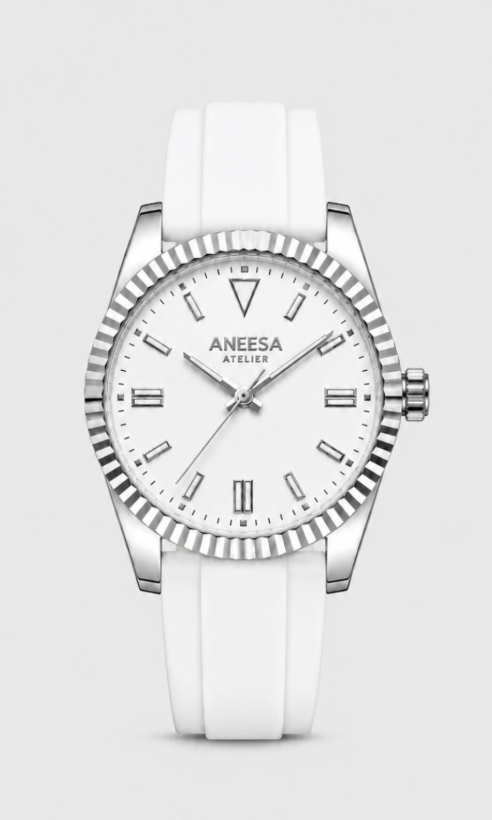 Aneesa wrist watch with a white dial, silver-tone fluted bezel, and a white silicone strap, centered on a light gray background.