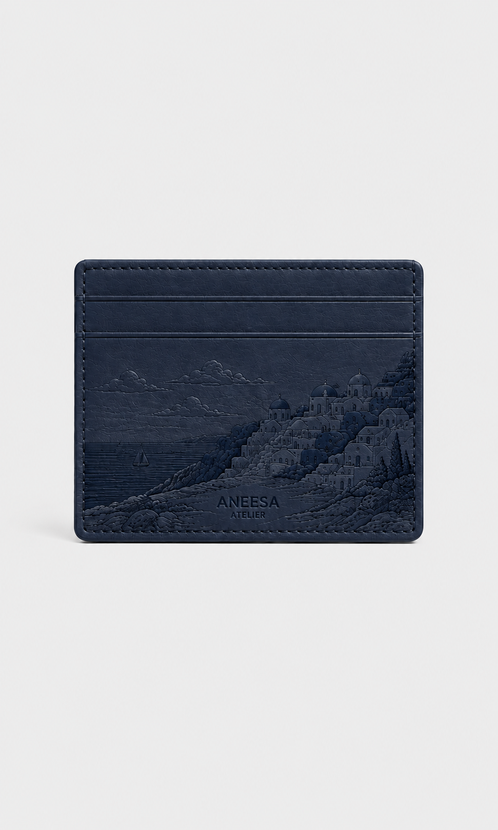 SEASIDE navy leather card holder with embossed Mediterranean coastal village design by ANEESA Atelier